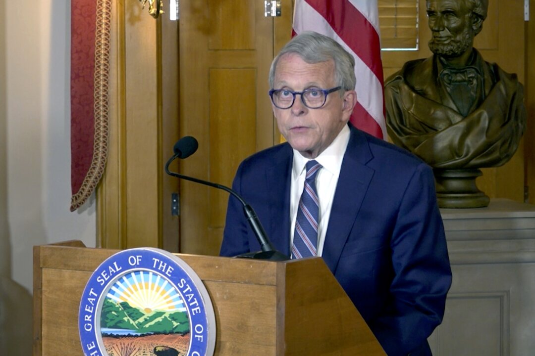 Ohio Gov. Mike DeWine answers a question while taking part in a panel discussion during a Republican Governors Association conference in Orlando, Fla., on Nov. 16, 2022. (Phelan M. Ebenhack/AP Photo)