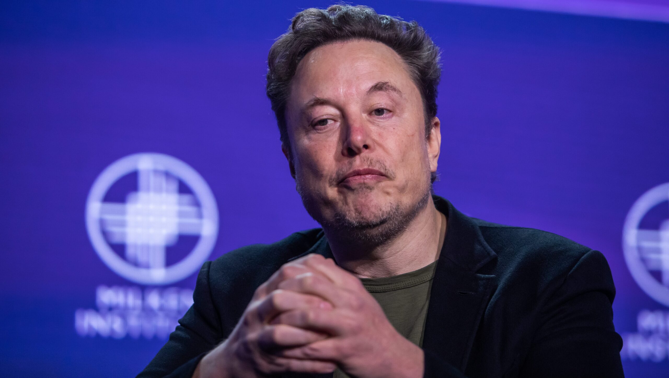 BEVERLY HILLS, CALIFORNIA - MAY 6: Elon Musk, co-founder of Tesla and SpaceX and owner of X Holdings Corp., speaks at the Milken Institute's Global Conference at the Beverly Hilton Hotel,on May 6, 2024 in Beverly Hills, California. The 27th annual global conference explores various topics, from the rise of generative AI to electric vehicle trends and features participants, soccer star David Beckham and actor Ashton Kutcher. (Photo by Apu Gomes/Getty Images)